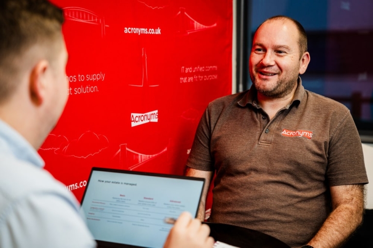 two people talking about services for clients in the financial industry