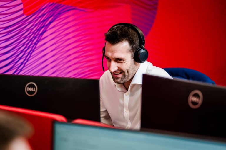 a person on a call at their desk